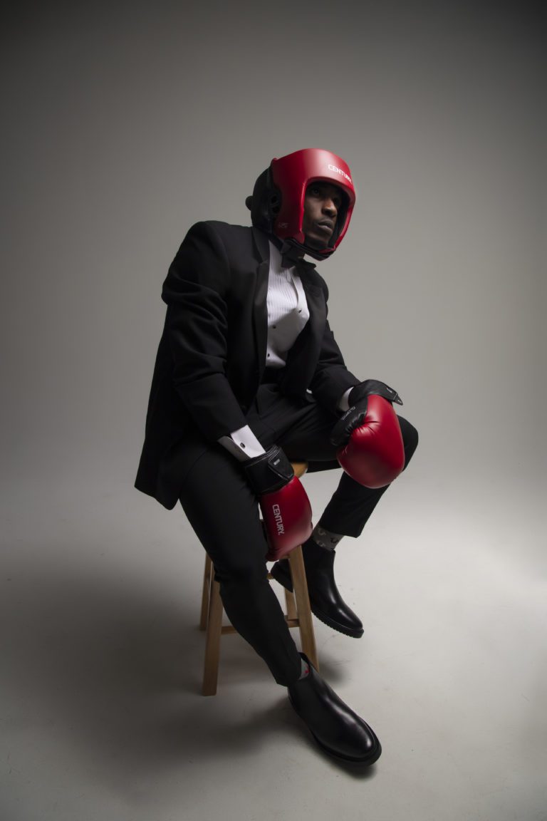 Boxer sitting on a stool