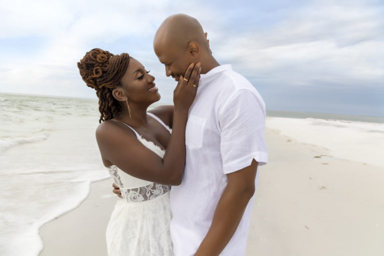 Couple standing on the shore at Clearwater Beach