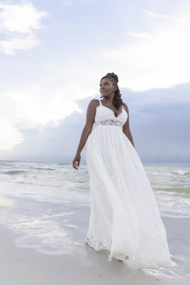 Woman walking along the beach